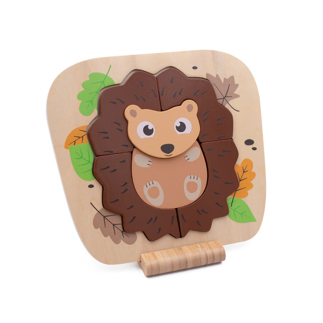 Wooden hedgehog puzzle on a beige background