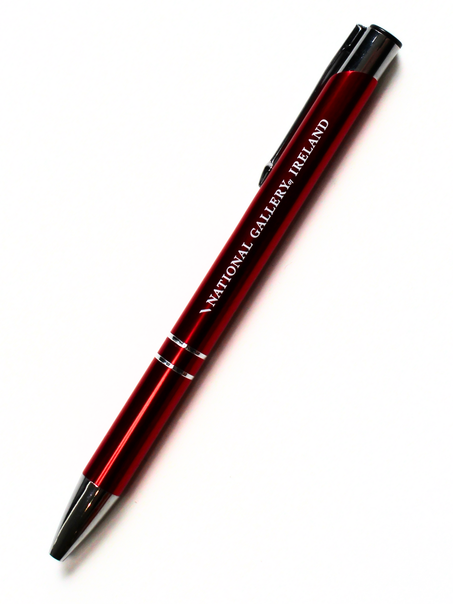 Red pen with silver accents on a white background, featuring 'National Gallery of Ireland' in white lettering.