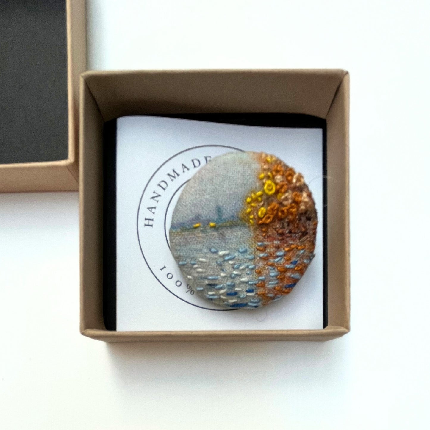Anita Reynolds brooch based on Monet's Argenteuil Basin with a Single Sailboat in its box