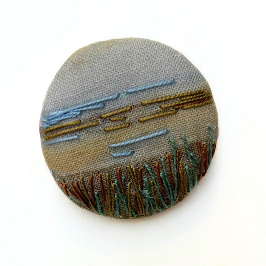 Anita Reynolds brooch based on Eva Gonzalès's Children on the Sand Dunes in close-up