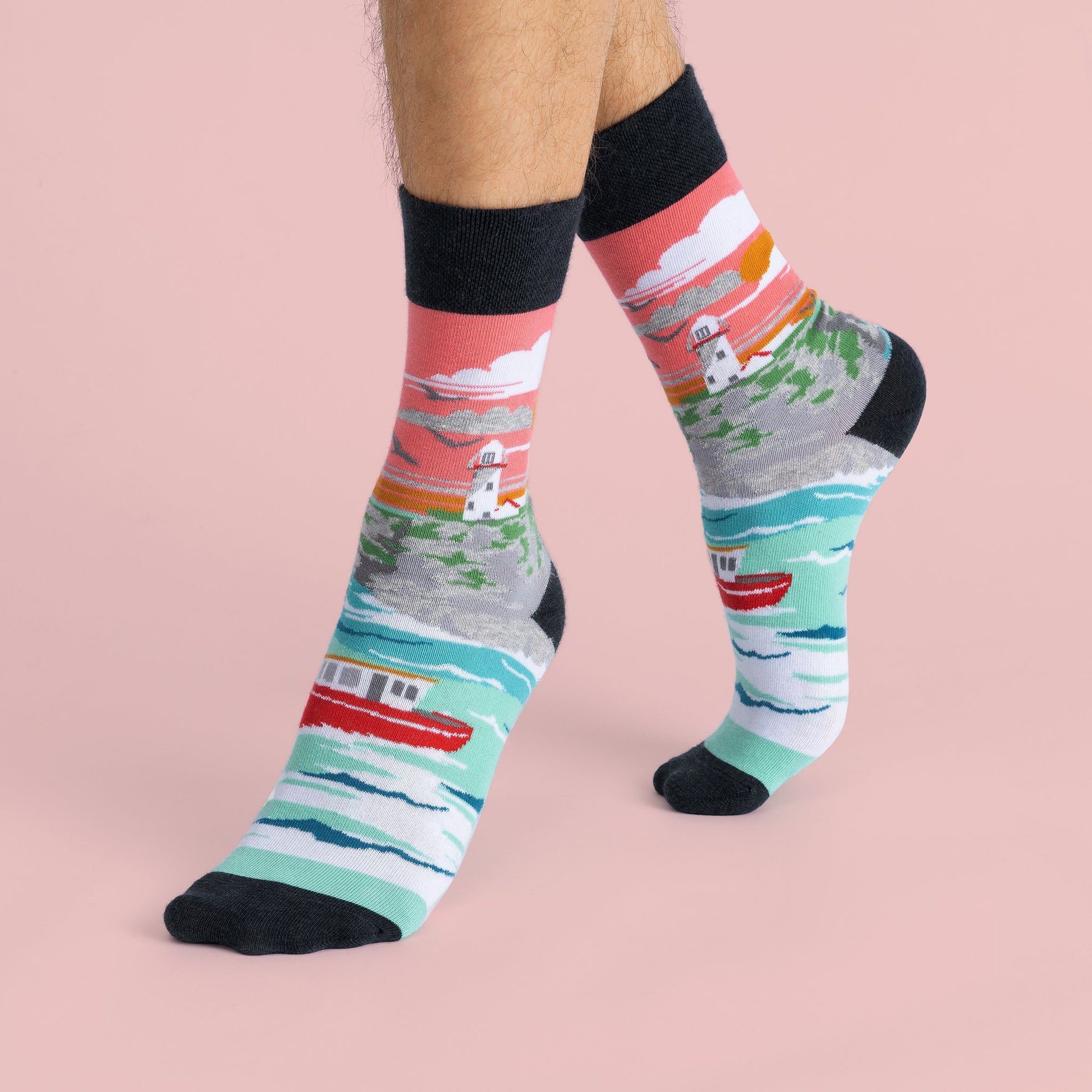 The previous socks on a models feet showing the design wrapping around the sock.