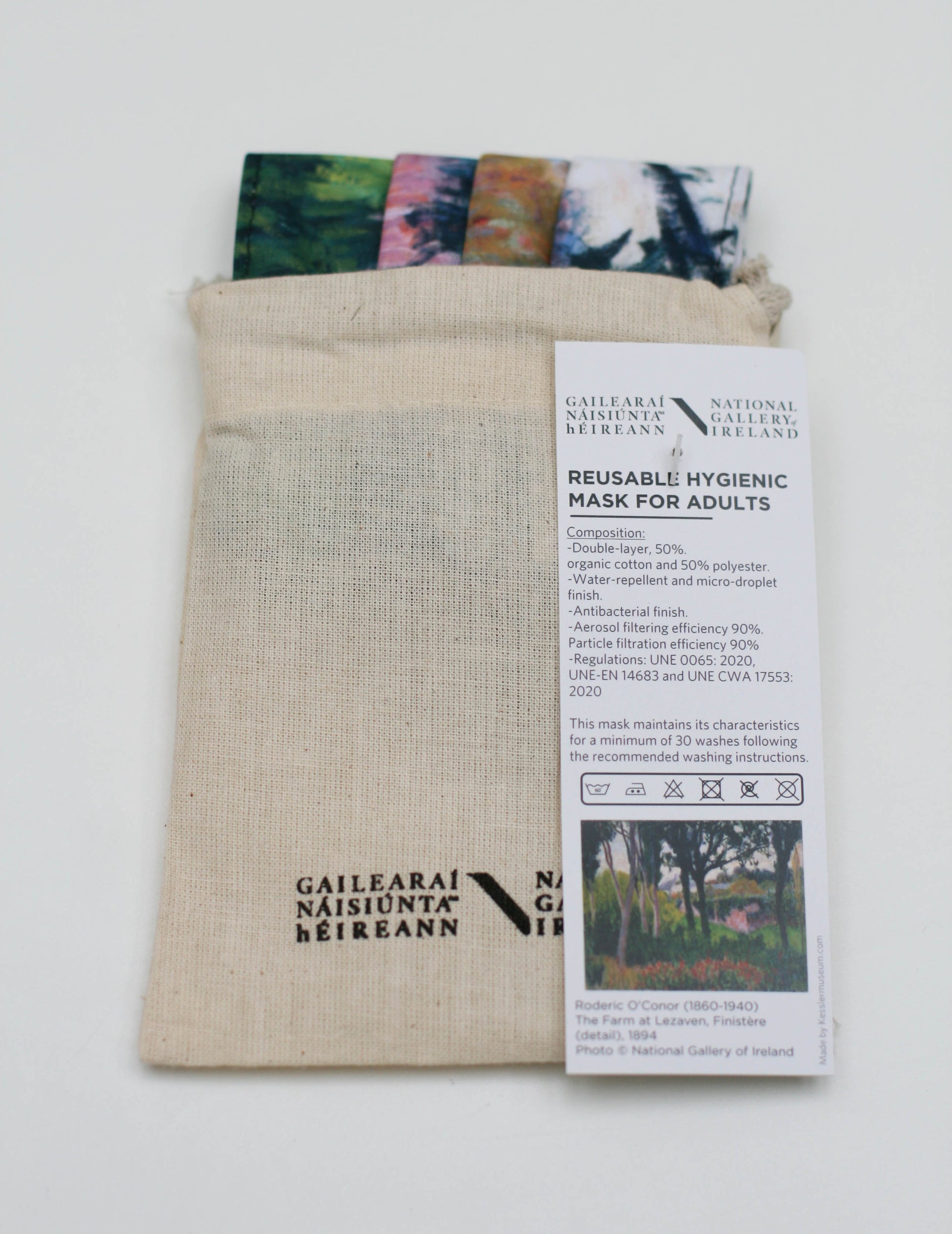 The mask is peaking out of the top of a basic cotton pouch with a draw string top. The Gallery logo is printed in black on the bottom of the pouch.