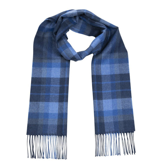 A blue and navy plaid scarf made from merino wool with tassles at either end.