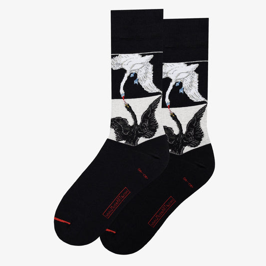 Black socks with bird design on a white background