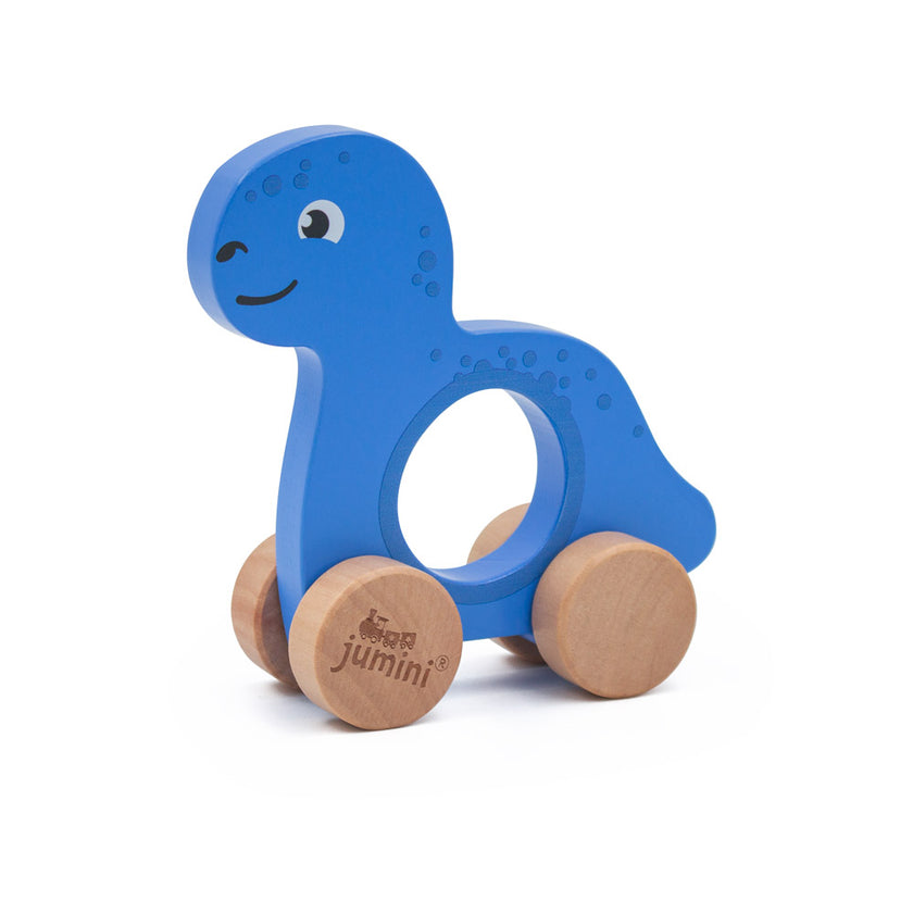 Blue dinosaur with a hole in its middle and wooden wheels on a white background