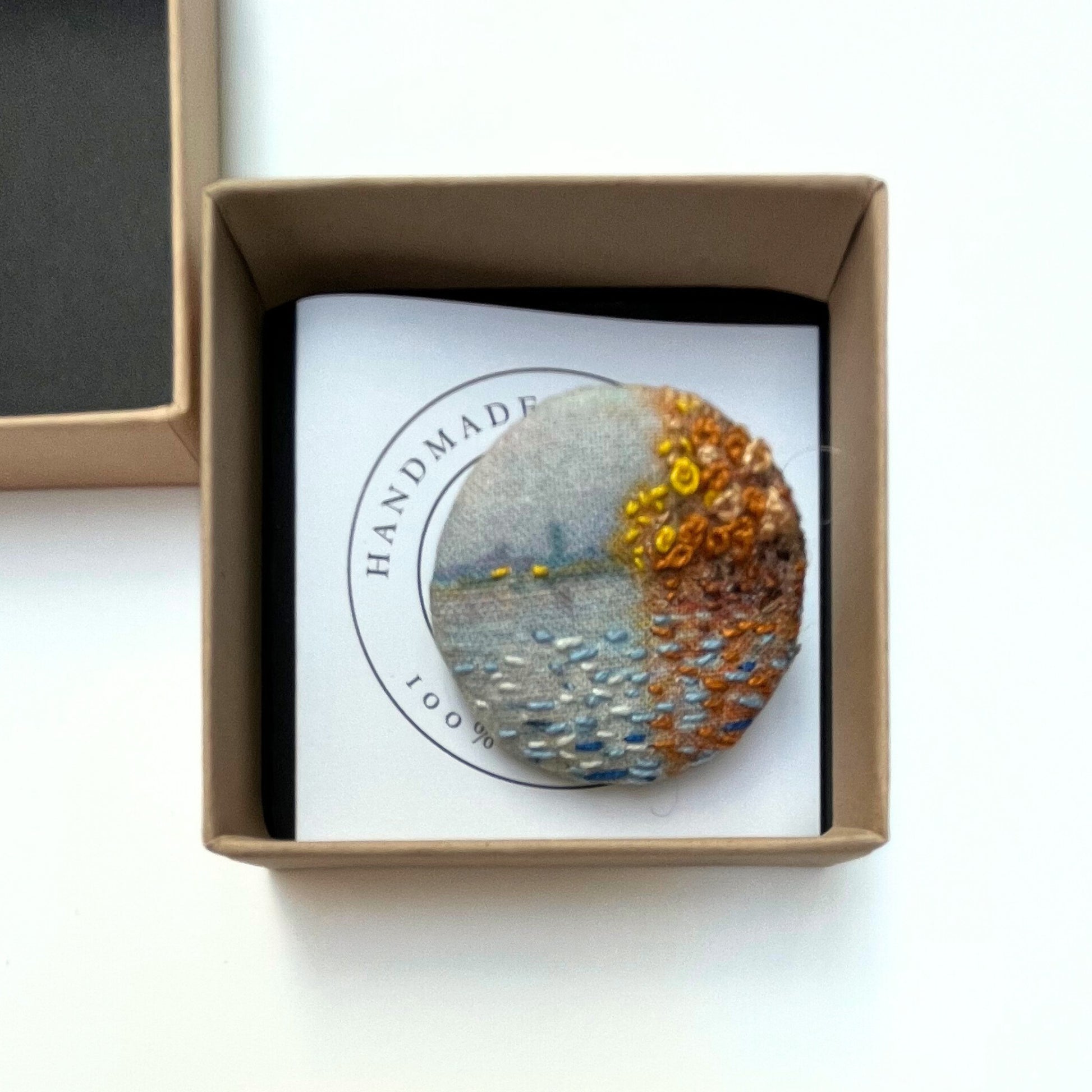Anita Reynolds brooch based on Monet's Argenteuil Basin with a Single Sailboat in its box