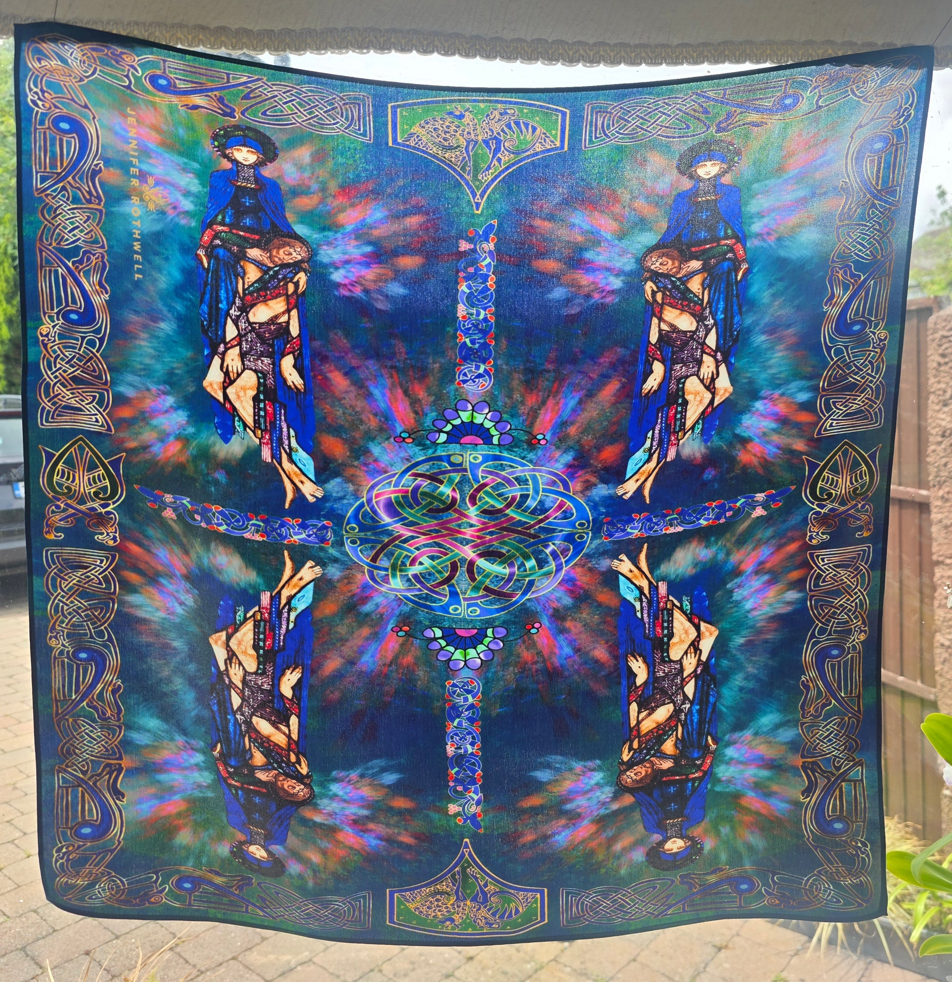 Colorful silk scarf with Celtic inspired design and images of Mother of Sorrow stained glass work by Harry Clarke. 
