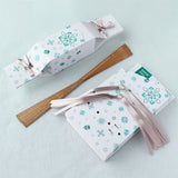 White reusable Christmas crackers with snowflake details