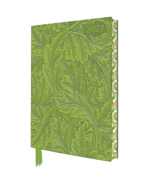 Green embossed notebook with floral design and '2024' on a white background