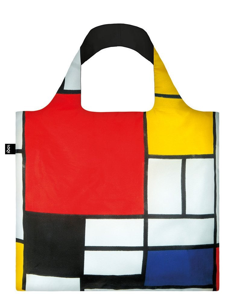 A square bag covered in a pattern of white squares and rectangles separated by black lines. Some rectangles are coloured yellow, blue and black, with one large red square in the top left. The handle lining is black.