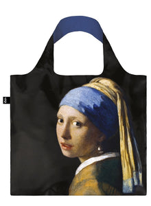 A square bag covered in a painting of a young woman wearing a  pearl earring, a blue and yellow scarf wrapped around her head. The lining of the handle is a matching dark blue.