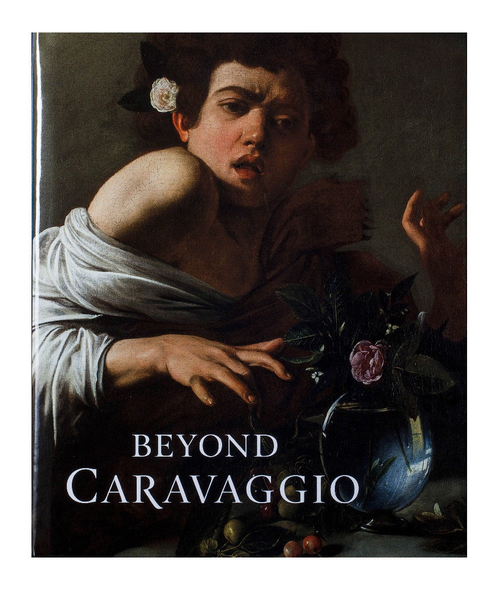 A painting of a young man in half shadow looks out at the viewer, his white top slipping from his shoulder, hand spread. Underneath is the title of the book.