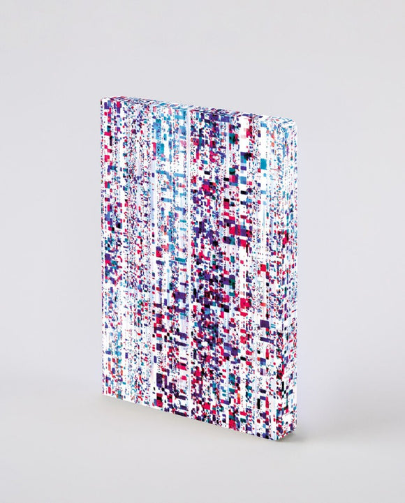 A notebook covered in a streaming pattern of small pink, purple and blue rectangles, that continues onto the paper edges.