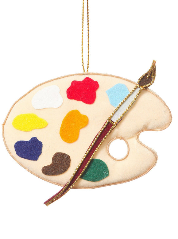 A small felt paint palette with colours and a paintbrush attached, hanging from a gold thread.
