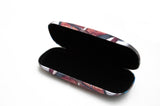 The previous glasses case open showing a black interior.