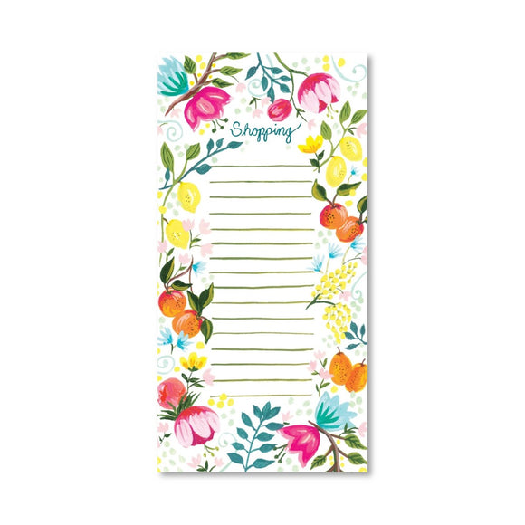 A lined notepad with shopping in blue cursive at the top. The edges are filled with painted illustrations of plants and citrus fruit.