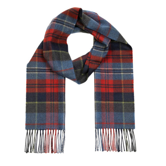 A tartan check scarf in red, navy and dark blue. There is matching fringe on both ends.
