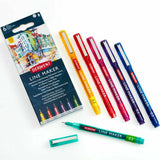 The six pens are laid flat beside the box. The barrels match the colours of each pen.