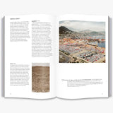 A two page spread on Andreas Gursky with text on the left and a photo of a car park and containers at a port on the right.