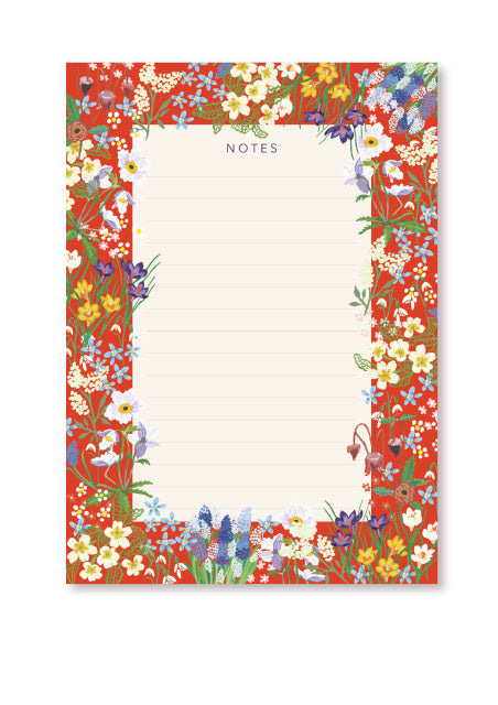 A white, lined notepad with a thick red border. Various drawings of flowers fill the border and spread slightly onto the white part ‘Notes’ is written in grey capitals at the top centre.