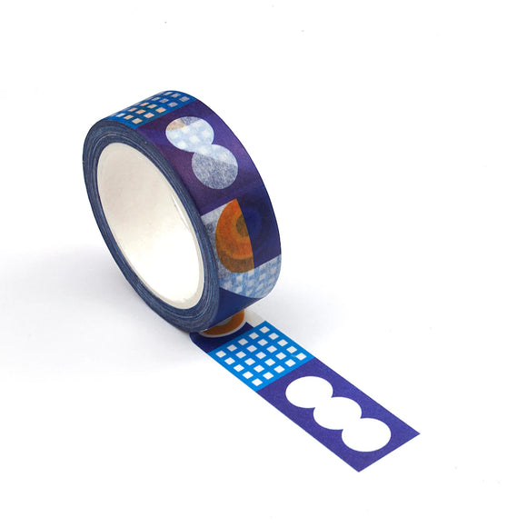 A roll of tape with patterns of circles and grids in purple, blue, white and orange.