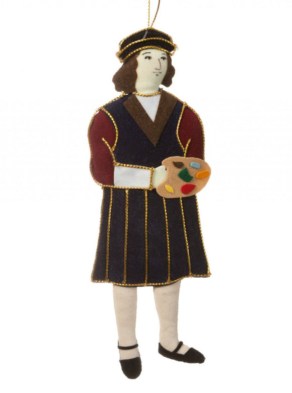A felt man wearing a navy and wine tunic detailed in gold thread with white tights, holding an artists palette, hanging from a gold thread.