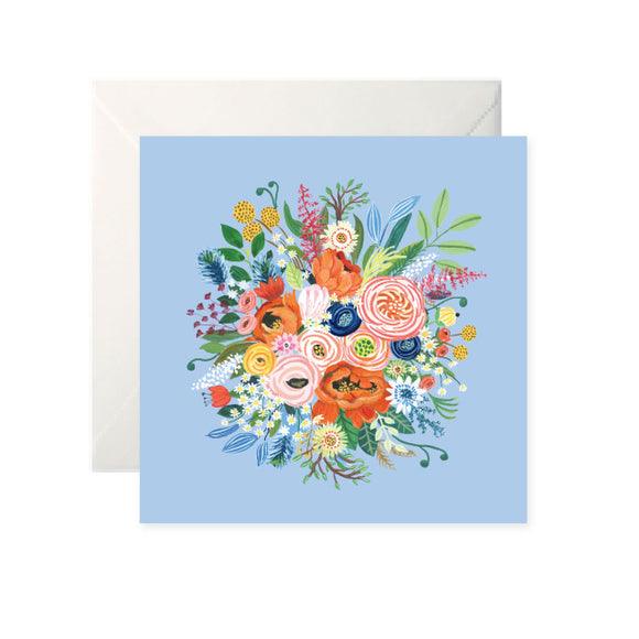 A light blue card with a large, colourful drawing of a bouquet of flowers in the centre.