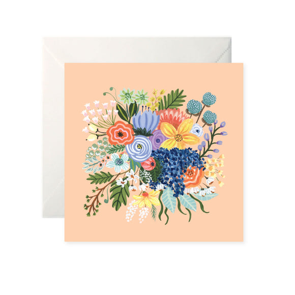 A peach card with a large, colourful drawing of a bouquet of flowers in the centre.