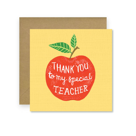 A yellow card with a large drawing of an apple in the centre. ‘Thank you to my special teacher’ is written in white inside the apple.