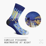 A dark blue sock with striped sections in blue, yellow, mint, and purple, around the leg and foot.