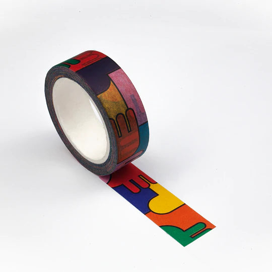 A roll of tape covered in a pattern of random shapes and colours including red, yellow, green, blue, orange, pink, and purple.
