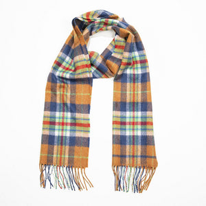 An orange scarf with an intricate check in navy, red and light green, with a matching fringe on both ends.
